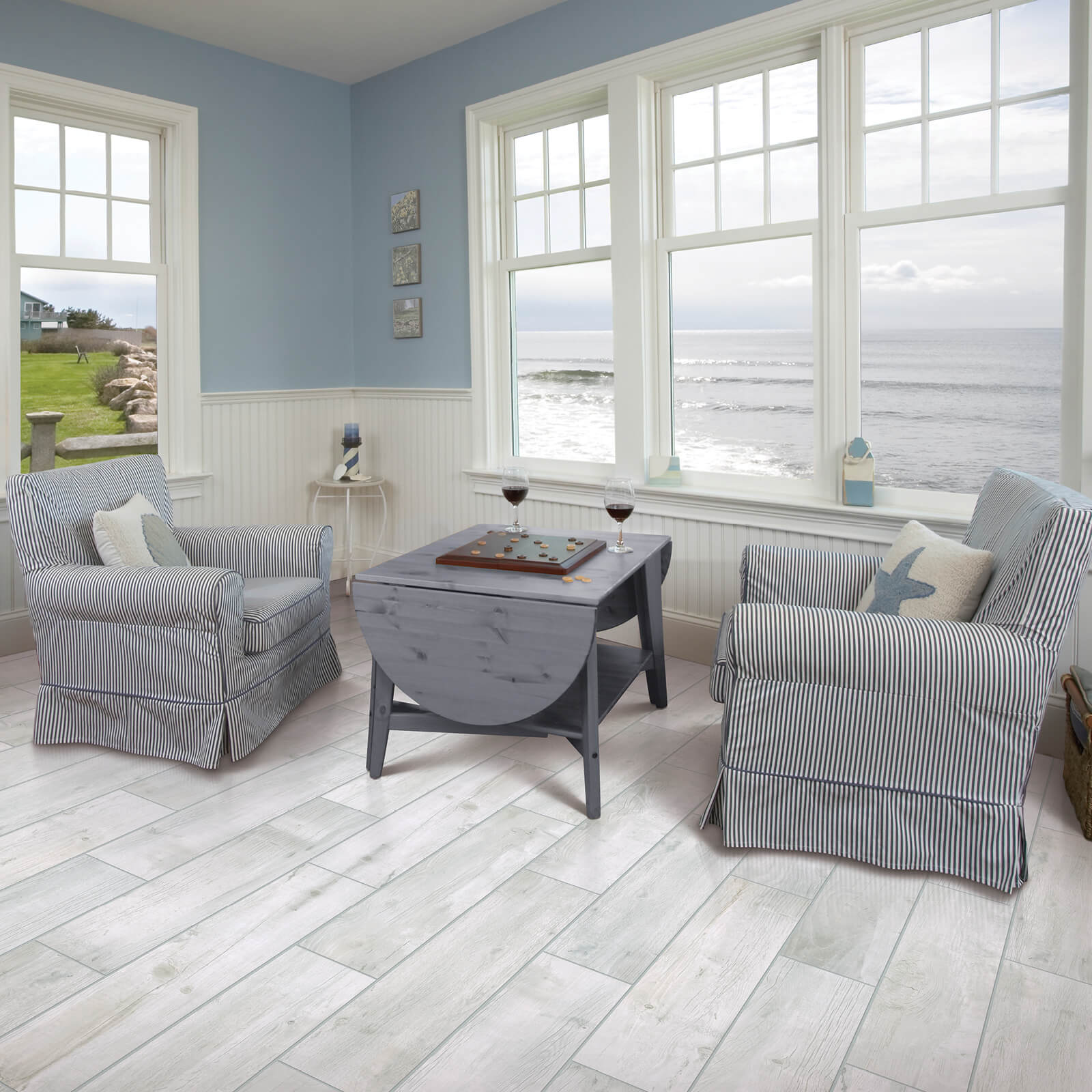 Laminate flooring in living room | Bobs Discount Carpet Inc